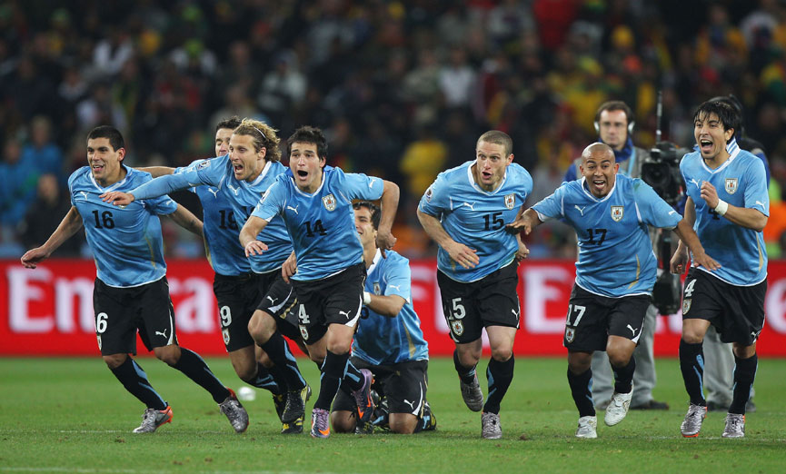 Uruguay celebrate their quarter-final penalty shoot-out victory over Ghana.